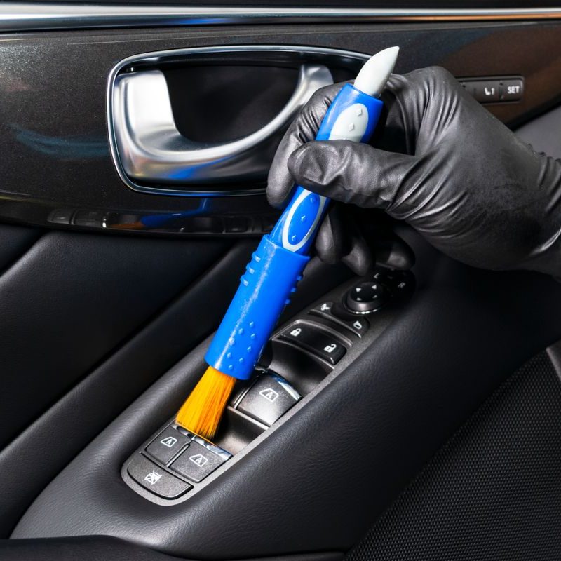 A,Man,Cleaning,Car,With,Cloth,And,Brush.,Car,Detailing.